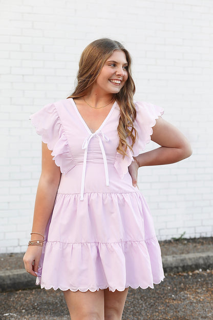 Emily Bow Detail Scalloped Dress in Purple
